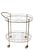 Chic Mid Century Hollywood Regency style rolling bar cart. The cart features two oval glass shelf surfaces, supported...