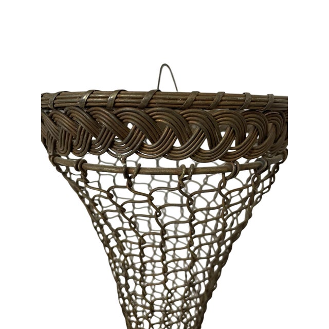 This French Woven Brass Chain Wall Hanging Antique Pocket Vase is a unique and stylish decorative piece that adds a touch...