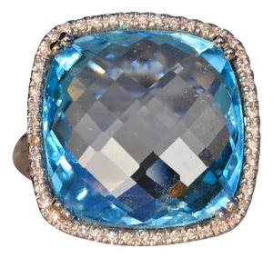 The 83rd Avenue: Checkerboard Cut Blue Topaz and Diamond Halo Ring in White Gold