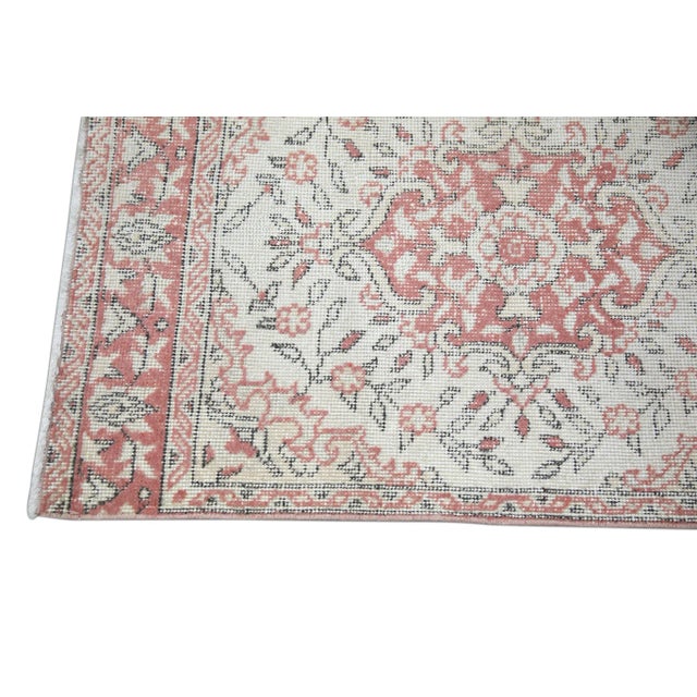 Introducing a one-of-a-kind vintage Turkish hand-knotted wool rug, carefully crafted by skilled artisans using traditional...