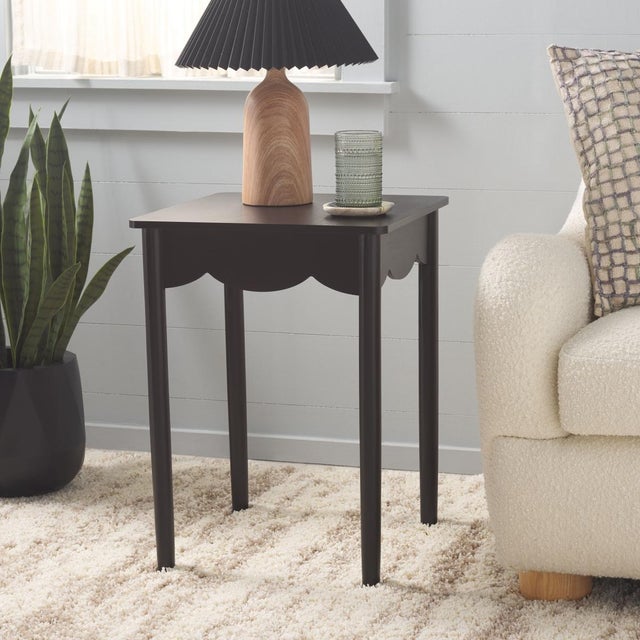 Enhance your home with the Paislynn Accent Table in a tranquil matt black color. This elegant table features a versatile...
