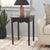 Enhance your home with the Paislynn Accent Table in a tranquil matt black color. This elegant table features a versatile...