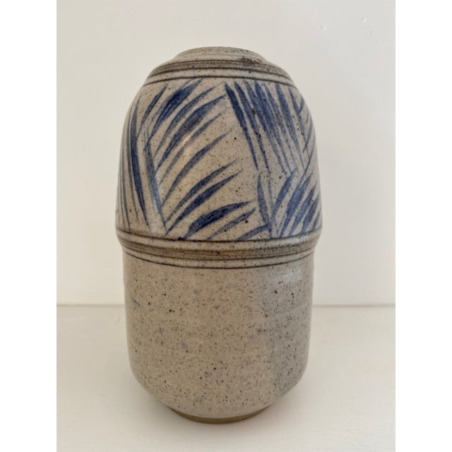Beautiful 1980s pottery vase skillfully rendered in stoneware with the thinnest walls making it incredibly lightweight and...