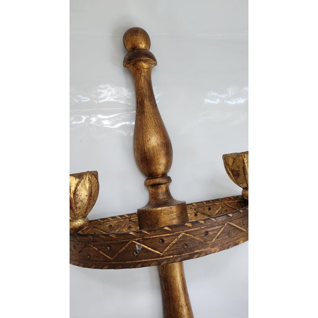 This unique vintage piece serves as both a wall-mounted candelabra and a plant holder, offering a versatile accent for...