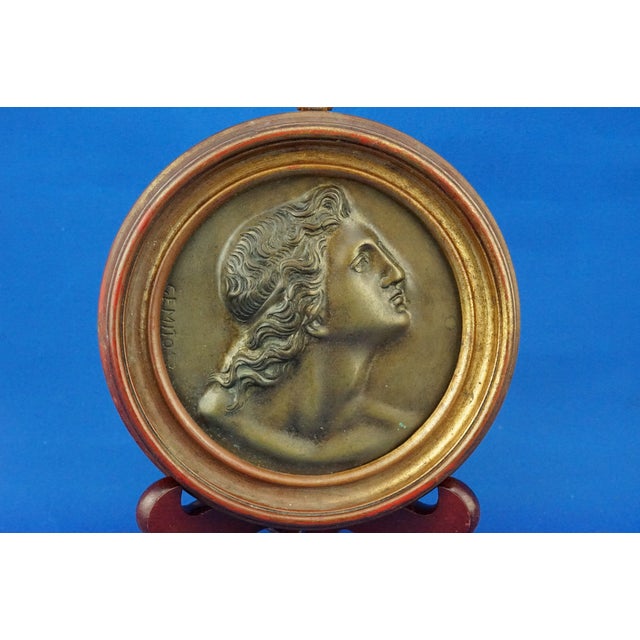Description of the item: A wonderful bronze sculpture depicting the face of Alexander the Great in bas-relief, with a...