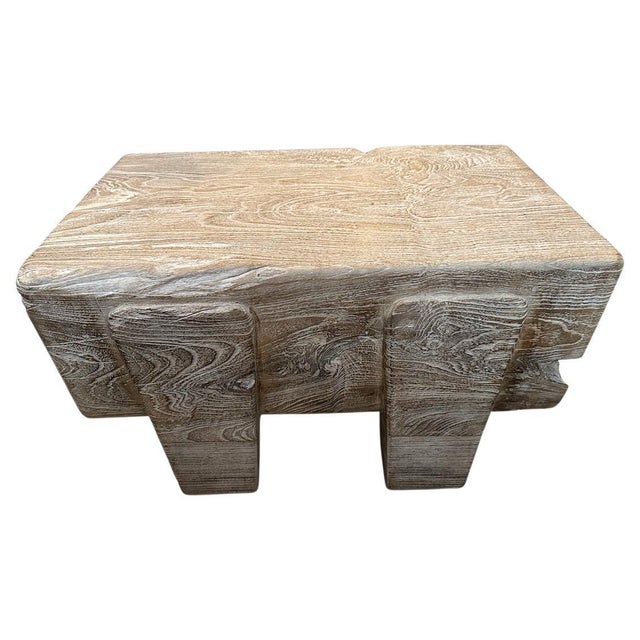 An impressive ten inch thick log floats 5.5” off the floor on minimalist cut out legs. We added a cerused finish revealing...