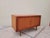 Vintage late 70s early 80s Danish modern credenza. The credenza is made out teak, and features tambour doors. The inside...
