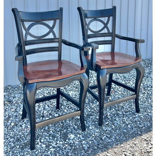 Great pair of counter stools by Hooker Furniture from their Preston Ridge Collection. Striking finish contrasting the rich...