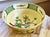 Apple blossom design on an antique white background. Very pretty color combination. The interior part of the bowl near the...