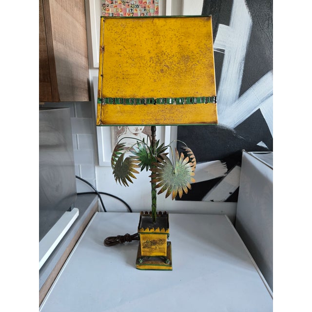 1960's Italian Yellow Tole Palm Tree Lamp with allover oxidation sold as found in working condition with original wiring.