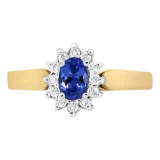 14K Yellow Gold 1/5 Cttw Round Diamond and 6x4mm Oval Blue Tanzanite Halo Ring (H-I Color, I1-I2 Clarity) - Size 7.75 For Sale
