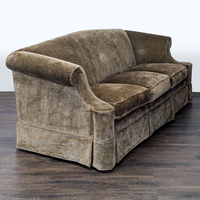 This Marco 3-seat sofa is perfect for your living room. It features a classic design with rolled arms and brown velvet...
