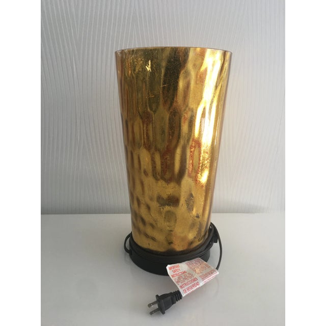 Decorative Lamp with Painted Gold Glass gives excellent accent to the room. Create soft lighting with one lightbulb. Can...