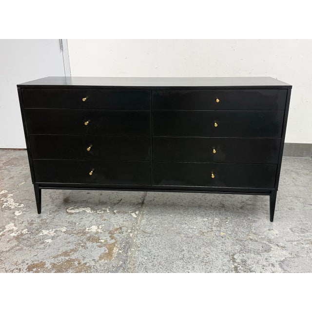 Design Plus Gallery presents a Mid-Century Double Dresser by Paul McCobb for Planner Group. This double dresser has a...
