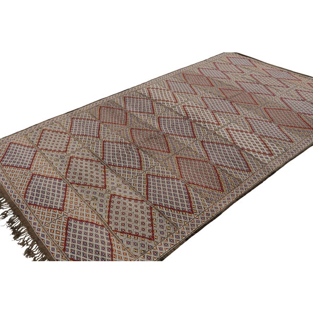 Handwoven in wool, a vintage 6x12 Zayane Moroccan Kilim - believed to originate from the Middle Atlas mountain range in...