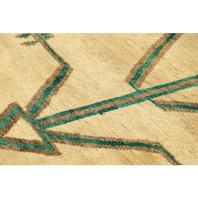 Made with hand-knotted wool circa 1950-1960, this 4x6 vintage Persian Gabbeh rug is among the latest entries to Rug &...