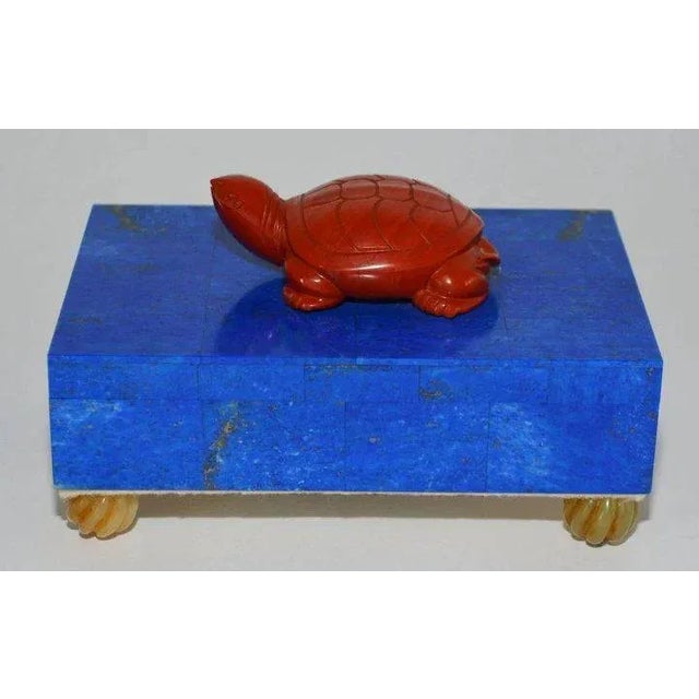 Afghanistan lapis lazuli box mounted with a turtle carved of semi-precious red jasper and supported by carved cornelian...
