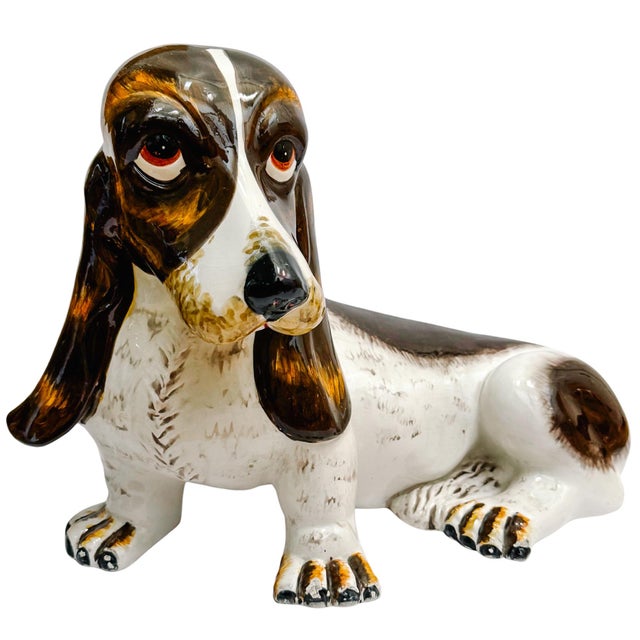An adorable hand-painted ceramic Basset Hound made in Italy, circa 1970. Measuring a substantial 19 inches long, this mid-...