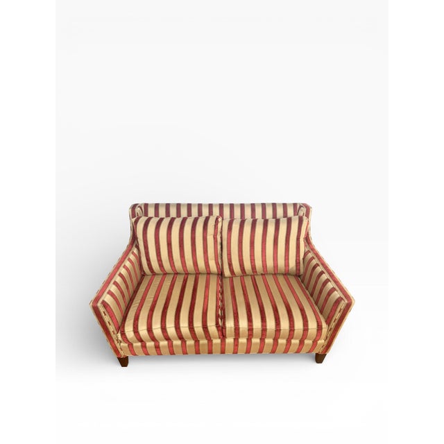 A beautifully tailored loveseat by Century Furniture, exemplifying the brand’s enduring reputation for craftsmanship,...