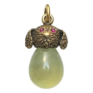 Early 20th Century Imperial Gilt Silver Egg Puppy Pendant With Ruby Eyes by Theodore Ringe For Sale