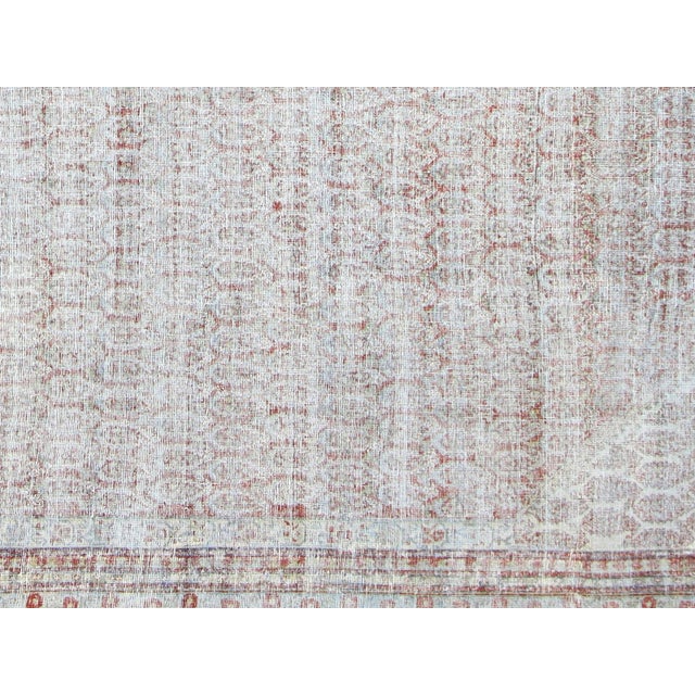 This authentic 1920s Persian Mahal Rug is a beautiful piece of craftsmanship, featuring a wool-on-cotton construction for...