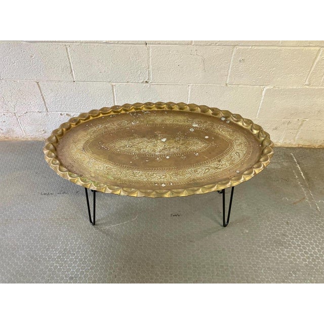 Vintage Moroccan Tea Table Great unique bohemian tea table. Metal top has great character and wear. We love the warm...