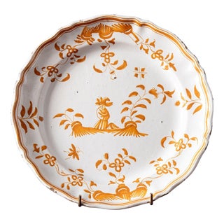 Antique Shaped Ochre Plate with Figure from Moustiers Faience, 1700s For Sale