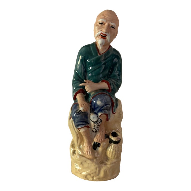 Vintage Porcelain Chinese Fisherman Figurine For Sale