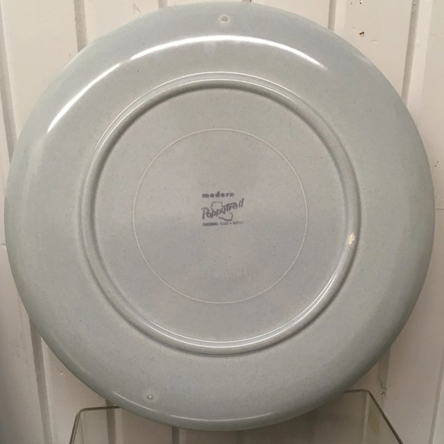 This large platter is a light blue color and 13.25 inches across! There is a small glaze skip on the bottom, this is not a...