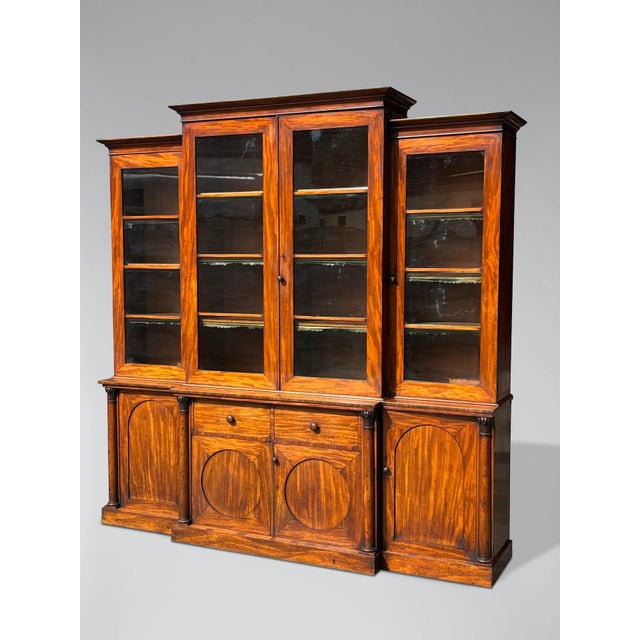 N untouched early 19th-century william iv period flamed mahogany 4-door library bookcase. It features a square-cornered,...