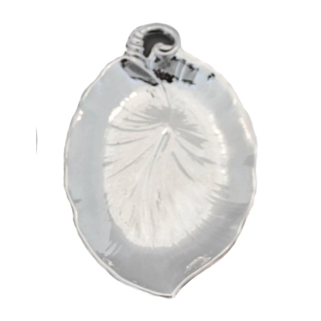 We are offering a pair of sterling silver leaf dishes by the Meriden Britannia Company of Connecticut. Designed in the Art...