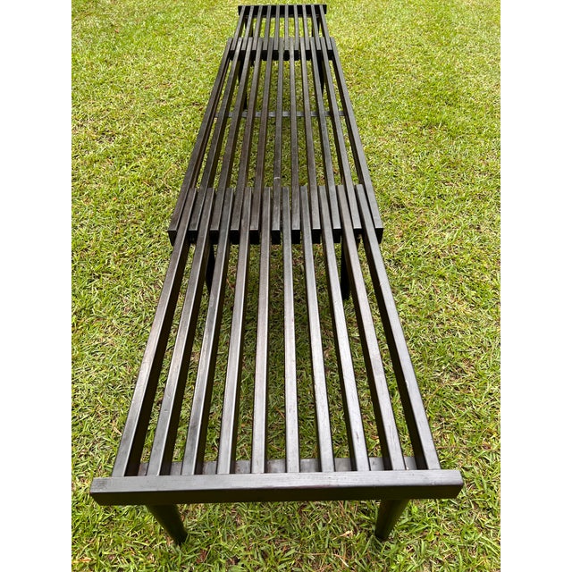 Beautiful and versatile expandable mid century minimalist wood slat bench designed by John Keal for Brown Saltman, circa...