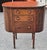 An early 20th Century Martha Washington sewing cabinet, made of walnut and mahogany wood. Design Features: This style...