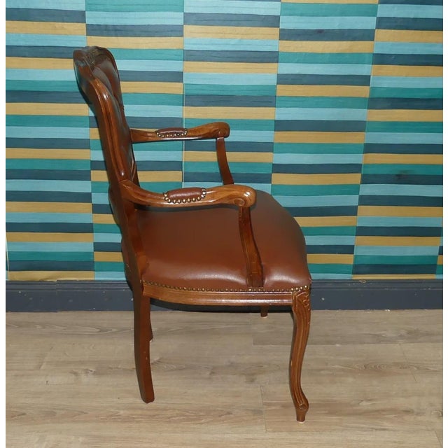 Classic Style Furniture Often found with tapestry upholstery, this one is beautifully finished in orange-brown faux...