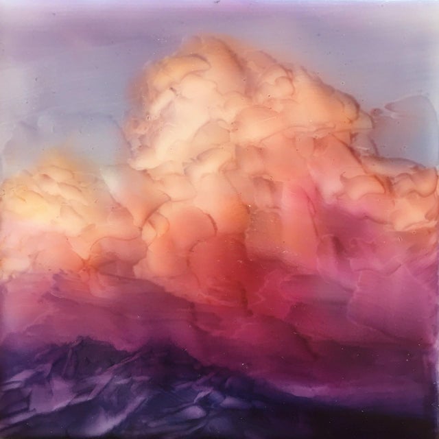 The artwork "Mountain High" features a dreamy landscape where soft, swirling clouds in warm hues of orange and pink rise...