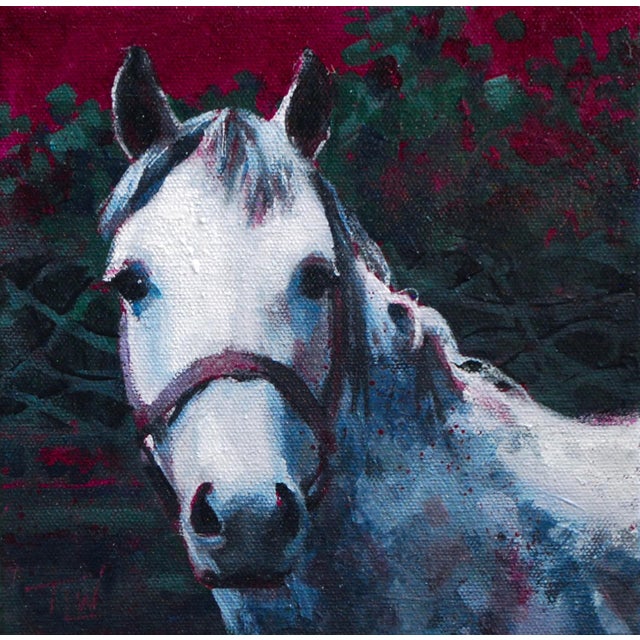 This mixed media piece features a striking portrayal of a horse's head, rendered with a blend of vivid colors and textures...