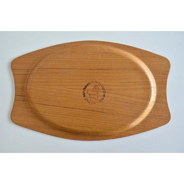 A beautiful teak tray from the Scandinavian company Silva. Thin-walled, single-piece teak plywood in the typical...