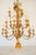 Large three tiered gesso, gilt wood, wrought iron 18 light Italian chandelier. Embellished with an oversized pinecone...