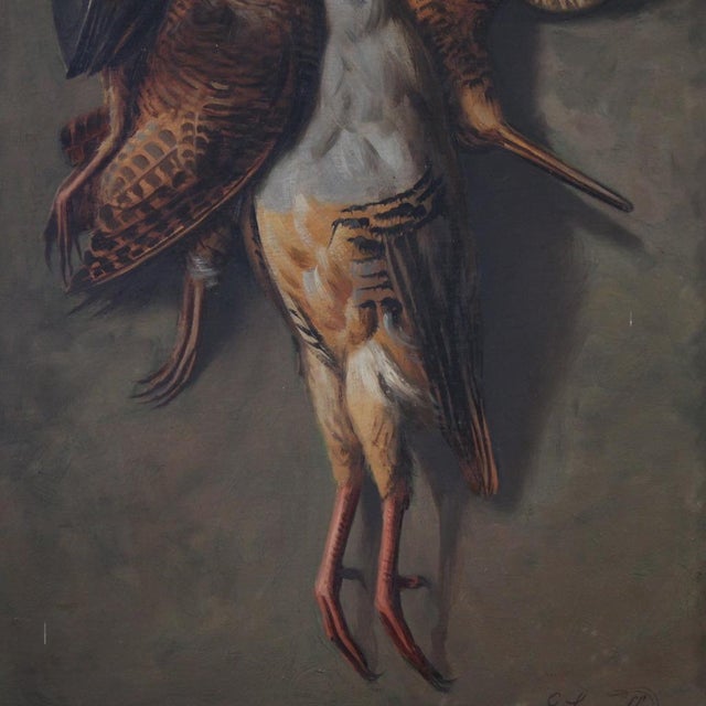 Italian painting from the first half of the 20th century. Painting oil on board depicting a still life with game, well-...