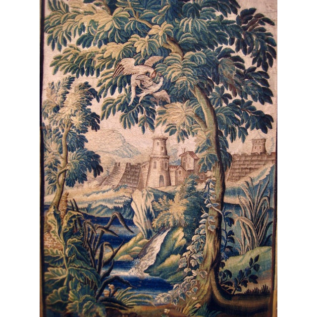 This beautiful verdure from Aubusson can be dated from the early 17 hundreds and present a lovely landscape showing a...