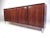 This stylish vintage sideboard features Scandinavian Modern style, impressive rosewood veneer, and spacious interior...