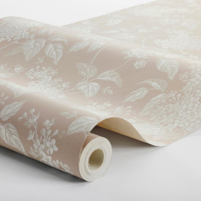 A romantic revival of a 1920s design from the Boråstapeter archive, Syren features a graceful repeat of stylized lilac...