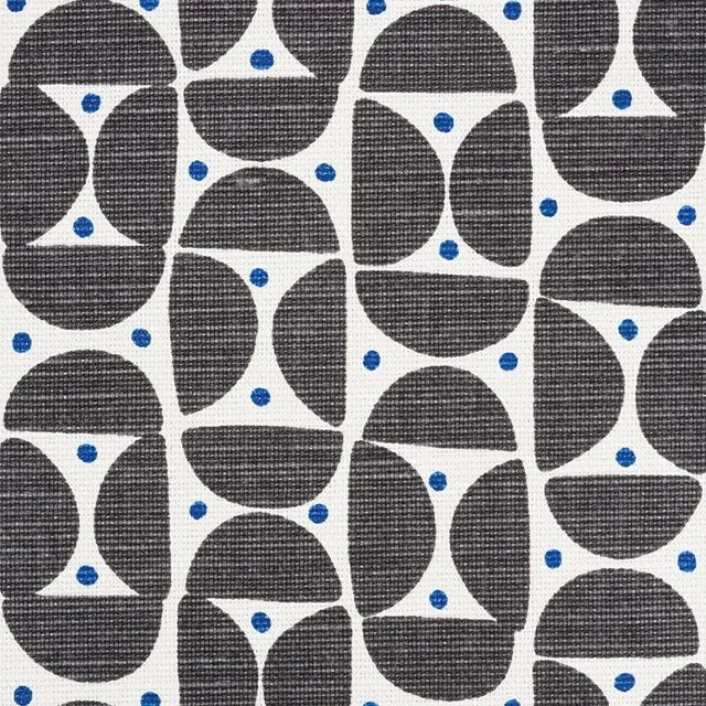 A snappy, small-scale print, Mezza Luna is a useful geometric pattern softened by rounded corners and slightly irregular...