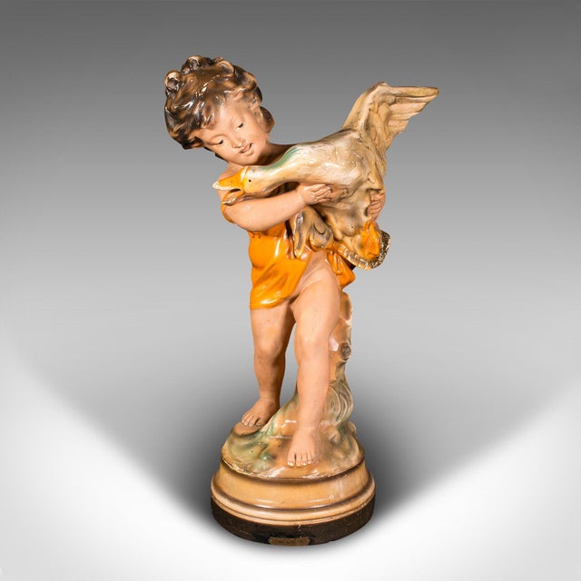 This is a large vintage display figure. An English, plasterwork decorative girl with duck ornament, dating to the Art Deco...
