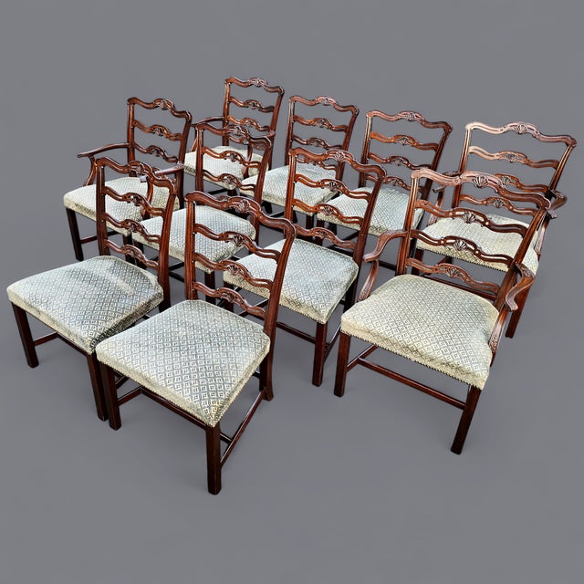 This Set of 10 Mahogany Chippendale-Style Ribbon Back Dining Chairs [4 Armchairs and 6 Sidechairs] is a stunning...