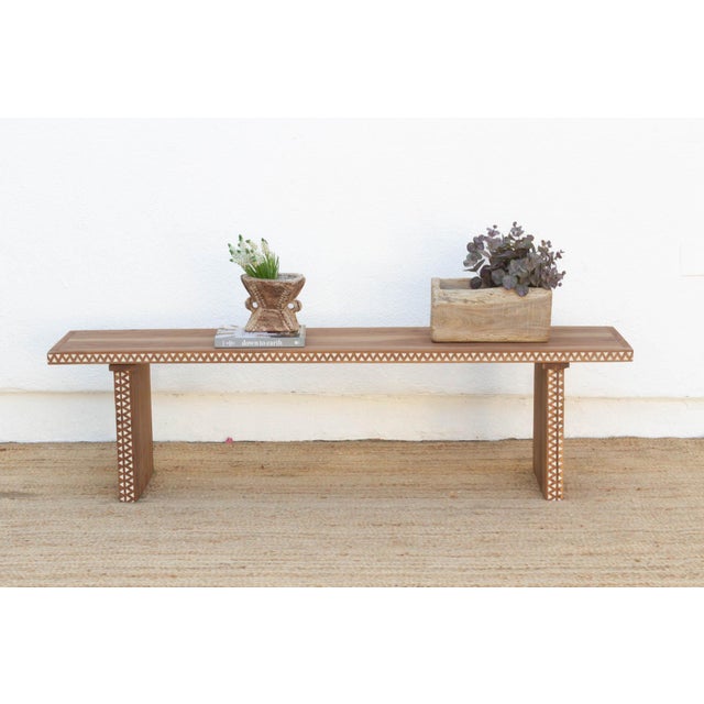 Made from reclaimed teak wood with a a stylish design, this reconstructed bench stand on two slat style legs. This boho...
