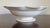 Antique 19th century Wedgwood creamware centerpiece bowl with ruffled rim and rising on a beaded pedestal foot. Marked on...