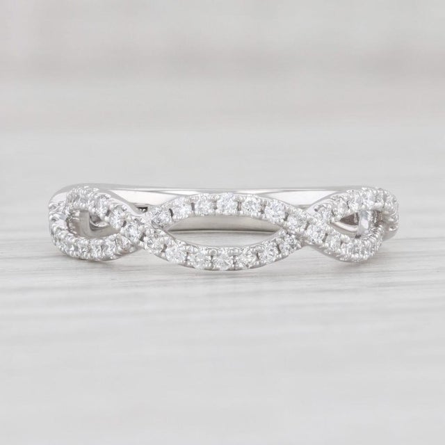 Gem: Natural Diamonds - 0.35 Total Carats, Round Brilliant Cut, H - I Color, VS2 Clarity Metal: 18k White Gold Weight: 4...