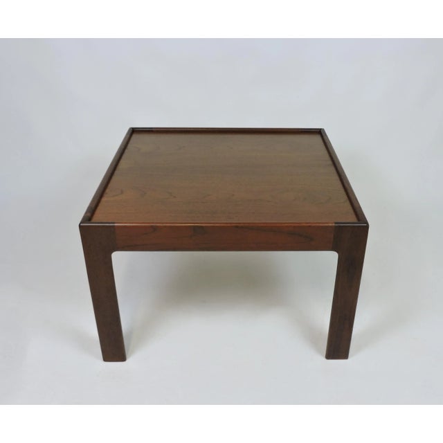 Handsome and substantial large end table designed by Illum Wikkelso and manufactured in Denmark by Neils Eilersen. This...