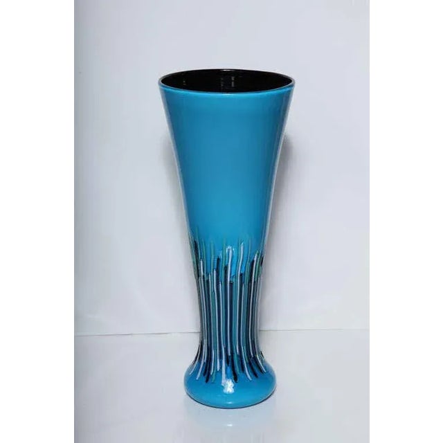 Documentation and original Venini Murano brochure for this exquisite and rare Versace designed vase. Numbered and limited...